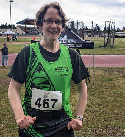 Nanaimo athlete Miranda smiling at a track meet