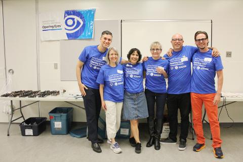 Healthcare professionals at Opening Eyes station at Coquitlam's Healthy Athletes Screening Day