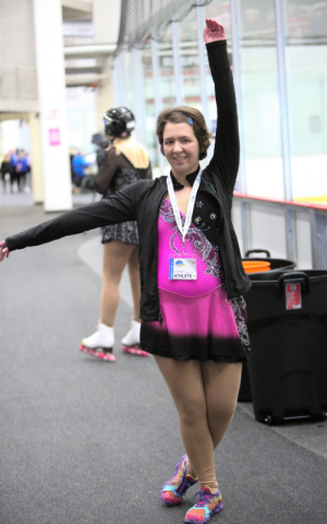 Victoria Sarty strikes a pose next to the rink.