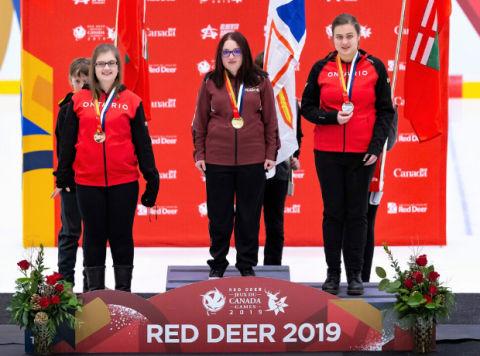 Melanie stands on the first place podium at Canada Games