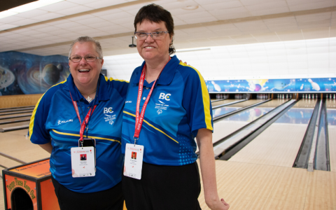 Fae and Jeri Lee pose for a photo at the bowling alley