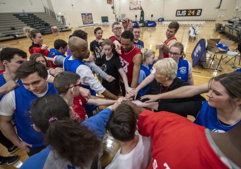 Sean Annan and his teammates end a practice with a huddle.