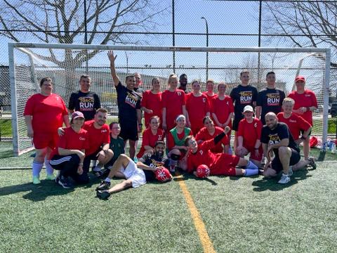 Special Olympics Team Canada women's soccer team group photo with BC LETR members