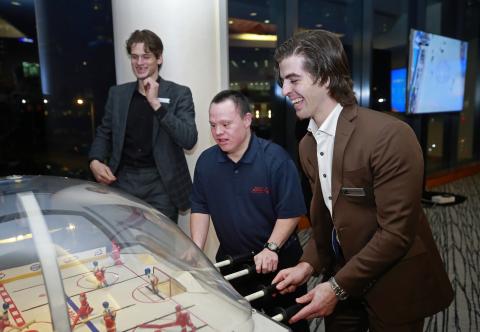 Conor Garland and Scott Fattedad playing foosball hockey