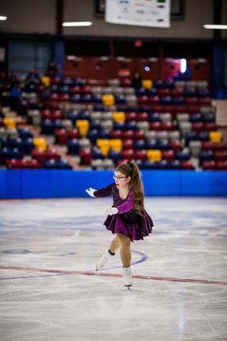 Darlene Jakubowski performs on the ice.