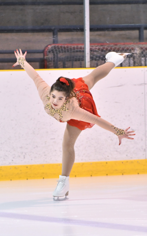 Grace Morris skates on the ice