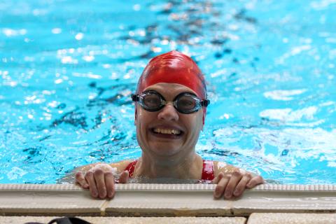 Kelsey smiling in swimming pool