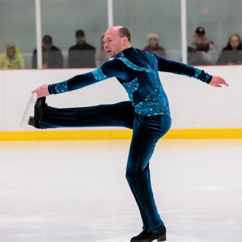 Special Olympics BC athlete Marc Theriault performs on the ice.