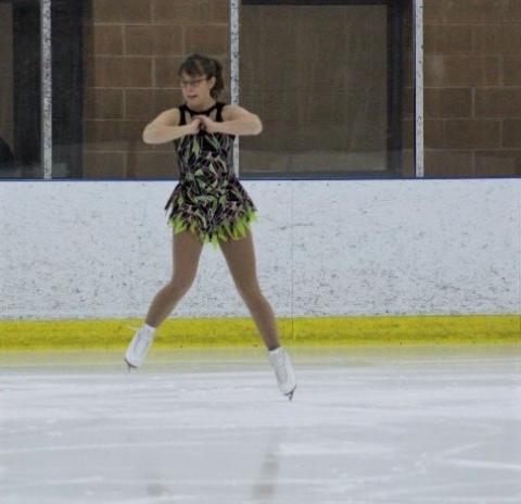 Nadia Bouillon performs on the ice