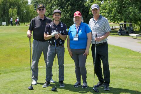 SOBC athlete Sarah Brown standing next to three other golfers