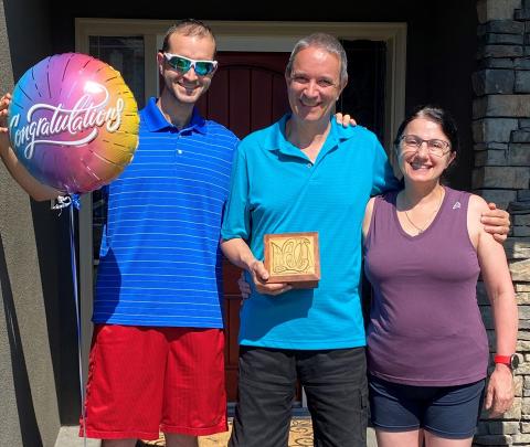 David Wilkinson with family and the Howard Carter Award