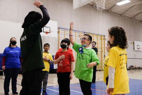 SOBC youth high fiving coach