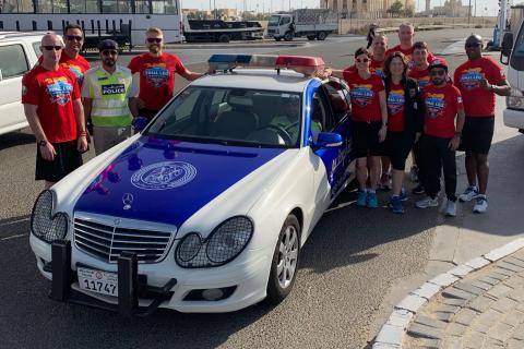 Oak Bay Police Department Constable Sheri Lucas (at right of car) was a Team Leader during the 2019 LETR Final Leg.