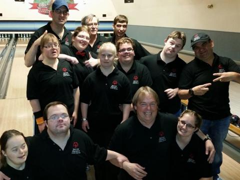 SOBC - Castlegar bowling team smiling and posing for group photo