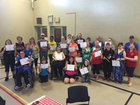 SOBC - Dawson Creek athletes holding their ceremony award certificates