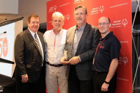 Colin MacKinnon (second from right) accepts his SOBC Hall of Fame award from Bernie Pascall, Randy Smallwood, and athlete Marc Theriault.