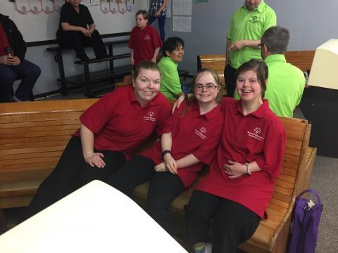 3 SOBC - Smithers bowling athletes sitting on bench for group photo