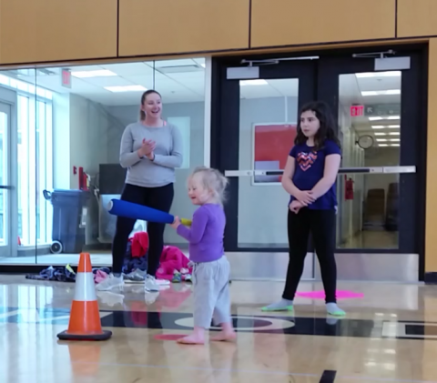 SOBC - Squamish ActiveStart participants having fun with volunteer cheering them on in background