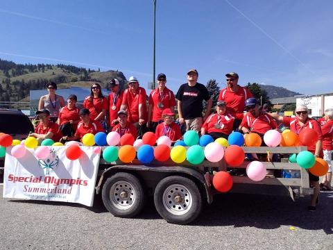 SOBC - Summerland athletes cheering in the back of a pickup truck