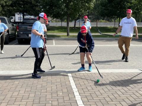 Street hockey players in action