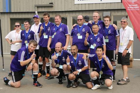 Stuart Holmes (far right) with the SOBC – Delta soccer team at the 2017 SOBC Summer Games.