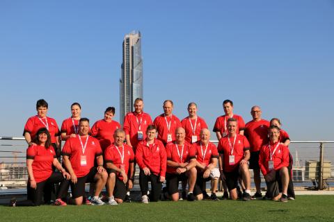 Misty Pagliaro (bottom left) soaking up the sun in Abu Dhabi with the Team Canada golf team at the 2019 Special Olympics World Summer Games.