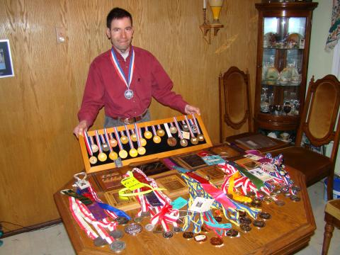 SOY Athlete Tyler Repka with his medal collection