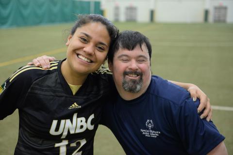 UNBC Timberwolves and Special Olympics BC Prince George soccer players having fun together in 2019.