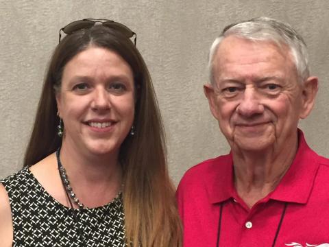 Judy Cyr poses for a photo next to LETR founder Richard LaMunyon